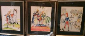 Three framed prints of color illustrations